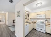 Thumbnail 33 of 46 - a kitchen and dining area in a 555 waverly unit
