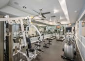 Thumbnail 10 of 46 - gym with cardio equipment at the whispering winds apartments in pearland, tx