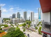 Thumbnail 60 of 66 - a view of the miami skyline from a balcony