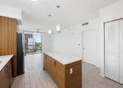 Thumbnail 50 of 66 - a kitchen and living room in a 555 waverly unit