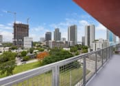 Thumbnail 57 of 66 - a view of the brisbane city skyline from a balcony