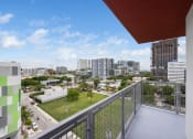 Thumbnail 56 of 66 - a balcony with a view of the city