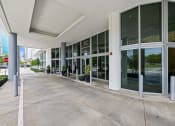 Thumbnail 9 of 66 - an empty parking lot in front of a building