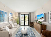 Thumbnail 29 of 47 - A modern living room with a white sofa, a TV, and a large window with curtains.