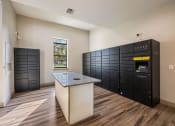 Thumbnail 42 of 67 - a kitchen with a counter top and a large island with a refrigerator and a black