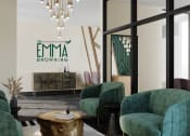 Thumbnail 4 of 24 - a living room with green chairs and a coffee table