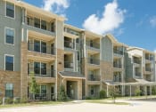 Thumbnail 33 of 36 - exterior apartments in spring