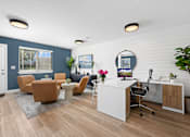 Thumbnail 9 of 15 - A room with a white desk and a brown chair.