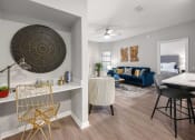 Thumbnail 7 of 67 - the residence on lamar apartment homes leasing office and living room