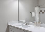 Thumbnail 9 of 26 - A white bathroom at Greys Harbor at Lake Norman, North Carolina