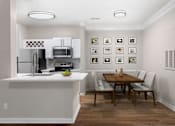 Thumbnail 3 of 26 - Kitchen And Dining Area at Greys Harbor at Lake Norman, Huntersville North Carolina