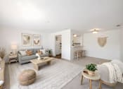 Thumbnail 1 of 48 - A living room with a grey couch, a wooden coffee table, and a white rug.