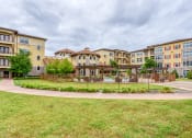 Thumbnail 5 of 13 - the preserve at ballantyne commons apartments courtyard and buildings