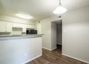 Thumbnail 4 of 26 - a kitchen and living room in an apartment