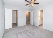 Thumbnail 8 of 36 - a view of a ceiling with a group of ceiling fans