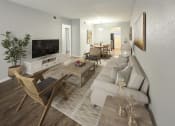 Thumbnail 3 of 29 - a living room and dining room with a couch and a tv