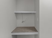 Thumbnail 23 of 29 - the closet in a bedroom of a house with an electrical outlet