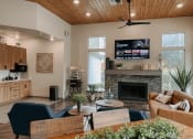 Thumbnail 26 of 32 - the view of a living room with a fireplace and a tv