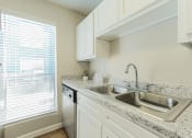 Thumbnail 9 of 26 - kitchen sink in north houston apartments