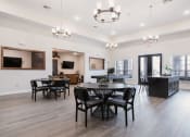 Thumbnail 12 of 29 - the gathering place at gardner village resident lounge with tables and chairs