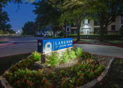 Thumbnail 22 of 29 - a nighttime view of the leasing office sign