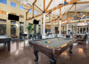 Thumbnail 6 of 33 - a large clubhouse with a pool table and a ping pong table