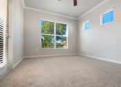Thumbnail 22 of 33 - a bedroom with a large window