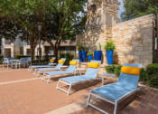 Thumbnail 38 of 49 - lounge chairs near the pool