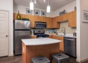 Thumbnail 16 of 49 - kitchen with brown cabinets