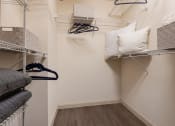 Thumbnail 23 of 49 - walk in closet with shelving features