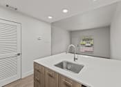 Thumbnail 8 of 24 - the kitchen of our studio apartment atrium with white countertops and a sink