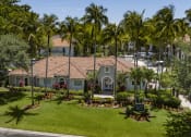 Thumbnail 37 of 52 - an aerial view of a house with palm trees