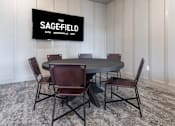 Thumbnail 30 of 48 - A conference room with a sign that says "The Sagefield Esto Jacksonville 2017".