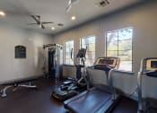 Thumbnail 21 of 22 - gym with exercise equipment at the district at highland village apartments