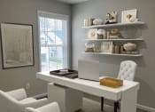 Thumbnail 7 of 36 - a home office with a white desk and chairs and a laptop