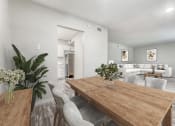 Thumbnail 1 of 20 - a living room and dining room with a wooden table