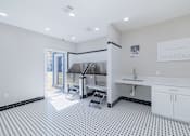 Thumbnail 44 of 62 - A kitchen with a black and white checkered floor.