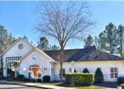 Thumbnail 3 of 29 - a white house with a tree in front of it