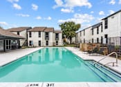 Thumbnail 15 of 22 - A swimming pool in a residential area with a 3ft depth sign.