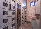 Thumbnail 25 of 40 - A row of stainless steel ovens are lined up in a kitchen.