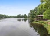 Thumbnail 18 of 36 - a pavilion on the bank of a river