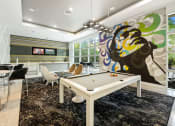 Thumbnail 20 of 44 - a billiards room with a white pool table