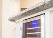 Thumbnail 13 of 22 - a refrigerator with its door open in a kitchen