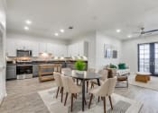 Thumbnail 2 of 21 - the preserve at ballantyne commons apartments clubhouse with dining table and kitchen