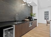 Thumbnail 16 of 24 - a kitchen with a sink and a counter top