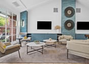 Thumbnail 13 of 24 - a living room with couches and chairs and a television