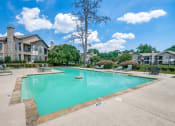 Thumbnail 22 of 30 - the preserve at ballantyne commons pool with apartment buildings