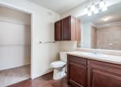 Thumbnail 9 of 30 - an empty bathroom with a toilet and a sink