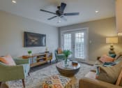 Thumbnail 2 of 36 - a living room with furniture and a ceiling fan