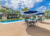 Thumbnail 30 of 36 - our apartments have a resort style pool and patio